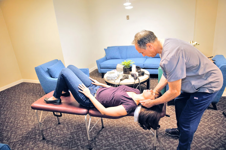 Emergency Mobile Chiropractor - Dr. Greg Malakoff